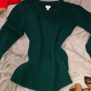 Green sweater with side slits